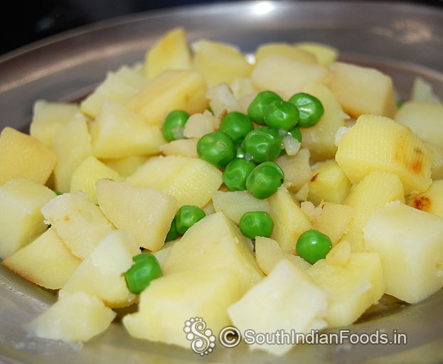 Boil potato and green peas